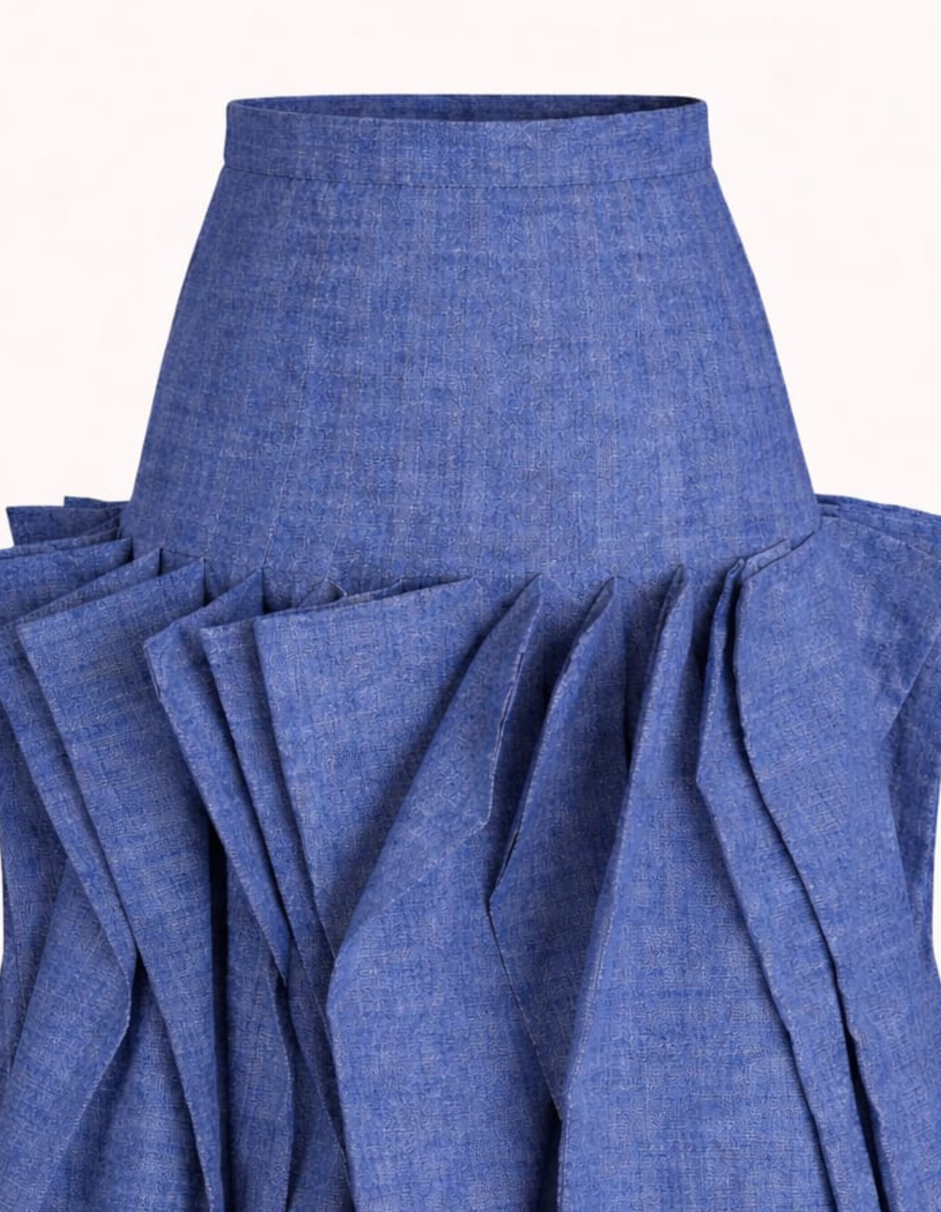 Blue denim skirt with ruffled details on a white background