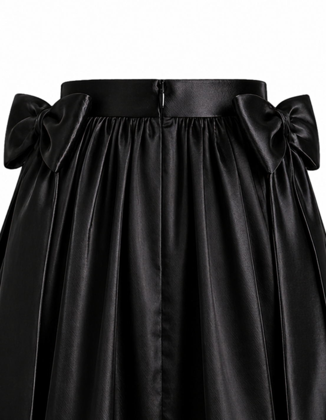 Black satin skirt with large bows on a white background