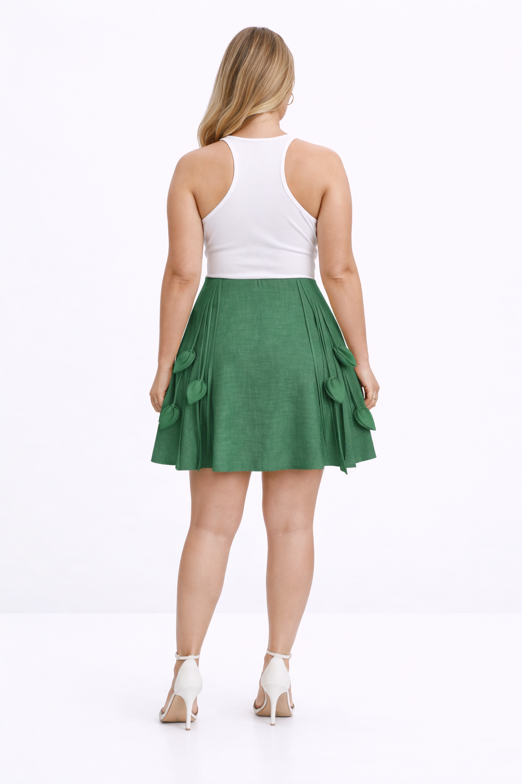 Green kingdom of daughters skirt with heart-shaped decorations on a white background