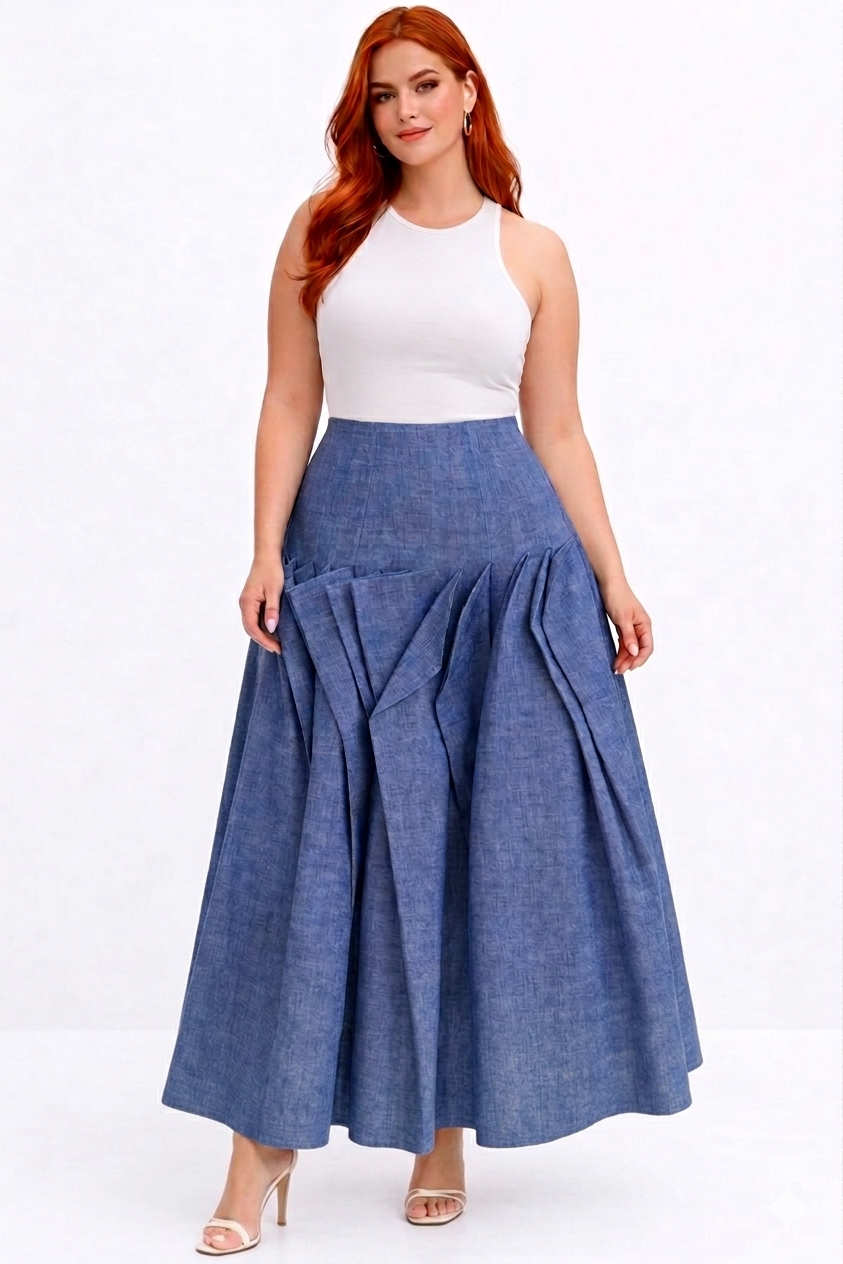 Woman wearing a white top and blue denim skirt on a white background