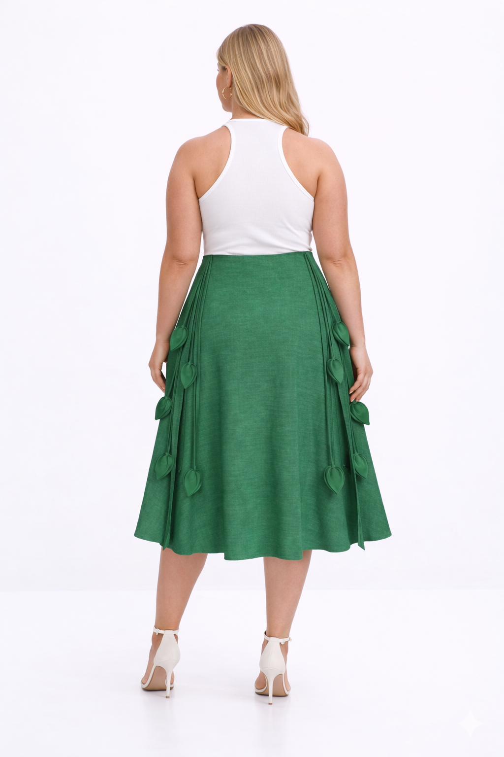 Green kingdom of daughters skirt with heart-shaped decorations on a white background