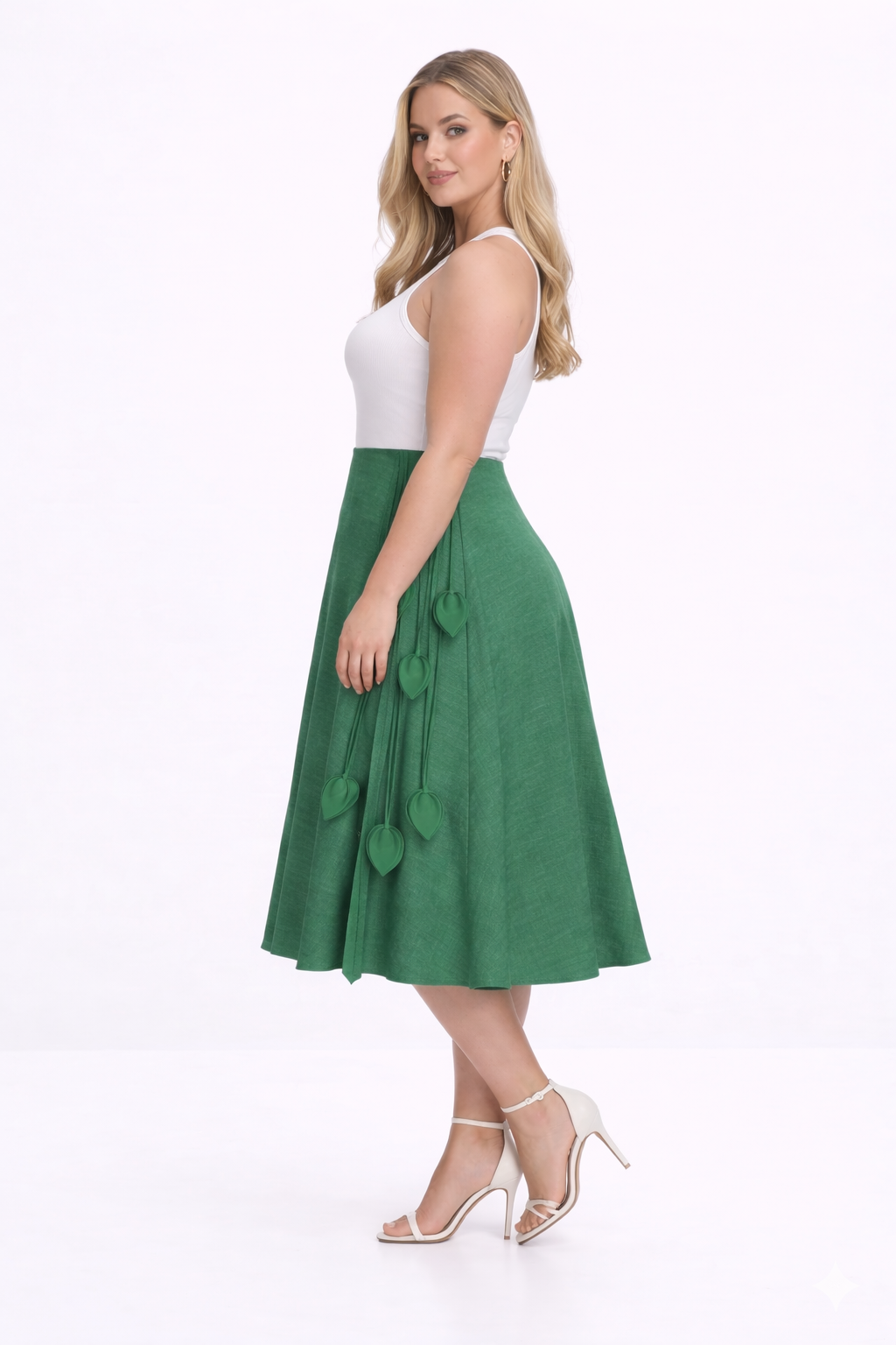Green kingdom of daughters skirt with heart-shaped decorations on a white background